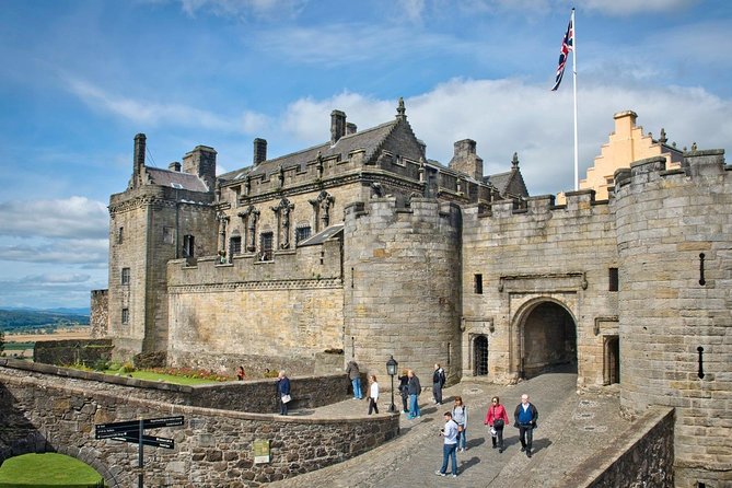 Day Trip to Loch Lomond and Trossachs National Park with Optional Stirling Castle Tour from Edinburgh - Balmaha and Loch Lomond: where the day can turn wet or wonderful