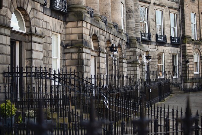 Edinburgh: Dean Village & New Town Walking Tour - George Street, statues, and the Neoclassical Dome break