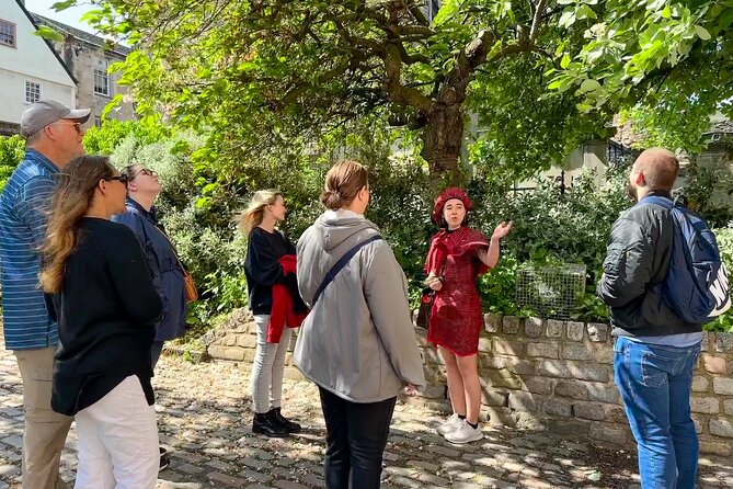 Edinburgh: Historical Gems Tour with Whisky & Local Flavours - Finishing near Holyrood Palace gates: a good handoff to your next stop