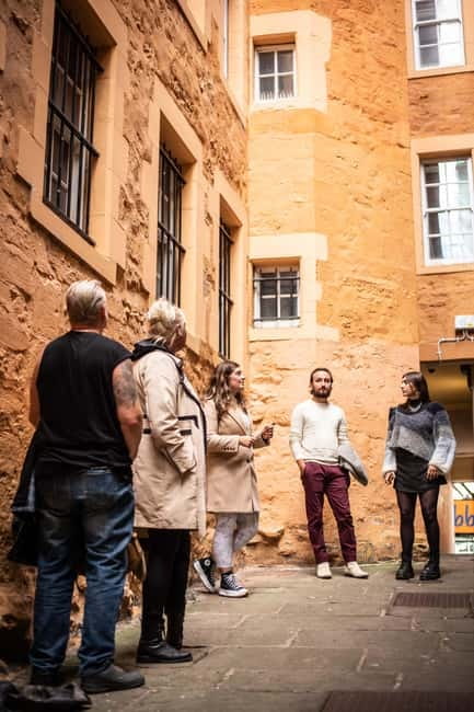 Edinburgh: Old Town Walking Tour with Holyrood Entry - Council Chambers to Edinburgh Castle views: power you can see