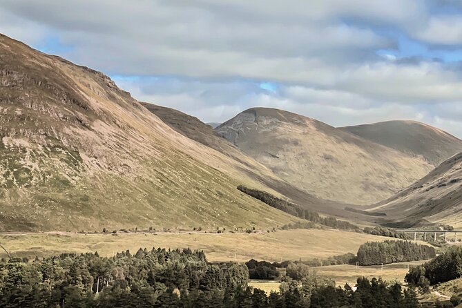 Glenfinnan Viaduct Glencoe and Fort William Tour from Edinburgh - Eilean Na Moine and Dumbledore’s Grave: a moody Loch Eilt stop