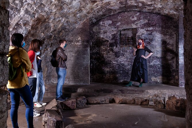 Underground Vaults Walking Tour in Edinburgh Old Town - Inside the vaults: crime stories, homeless refuge, and the witchcraft temple moment